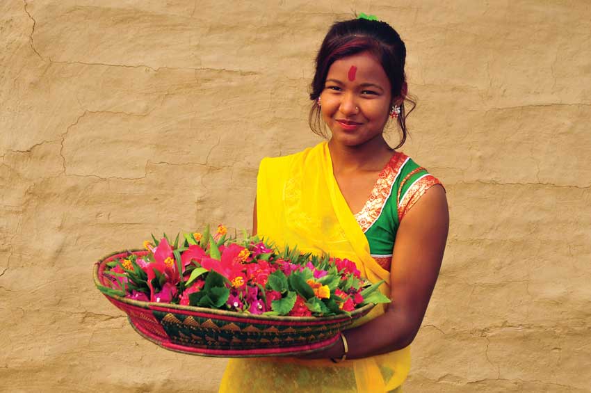 A-typical-tharu-women-in-her-traditional-dress-featured-at-yatra-magazine