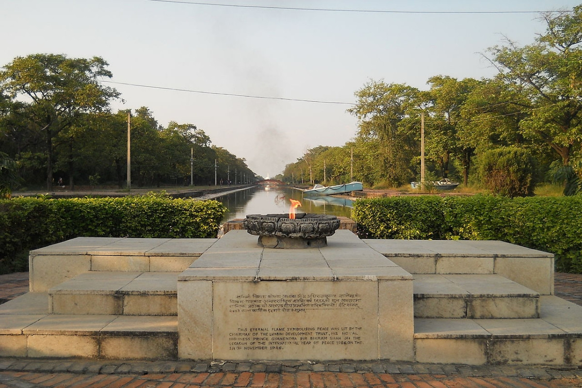 /eternal flame lumbini travel nepal